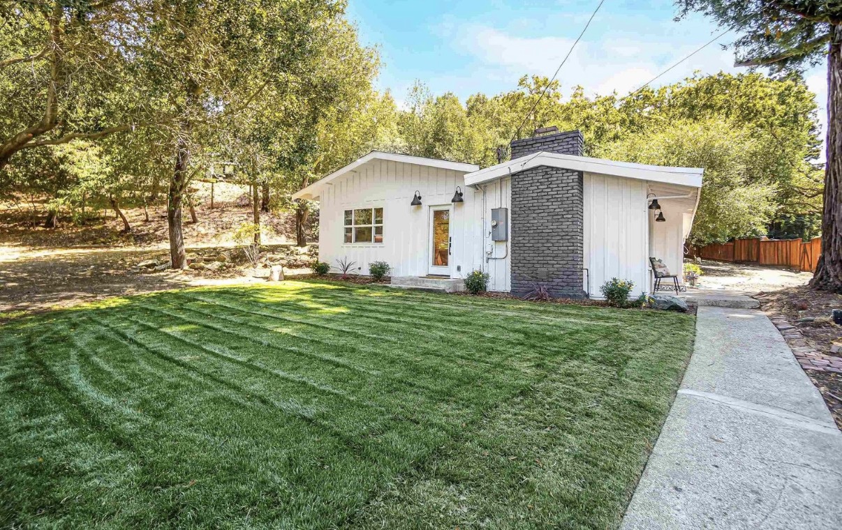Castle Hill home after landscaping with a green lawn and refreshed pathway