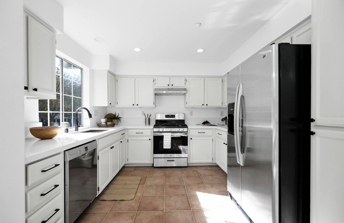 North San Jose kitchen after preparation with white cabinets and stainless steel appliances